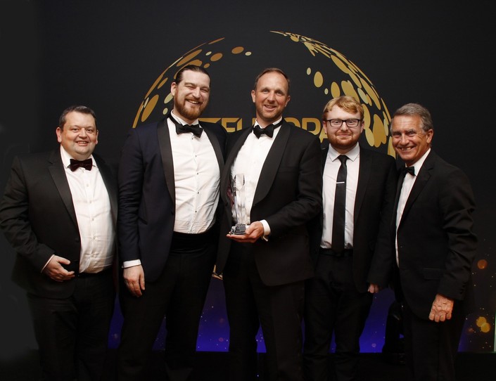 The Intersys team posing with their award and John Rees Chief Commercial Officer, Content Guru and BBC Radio's Gary Richardson. 