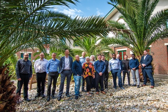 The Intersys team outside the Bourne Court head office in Essex. 
